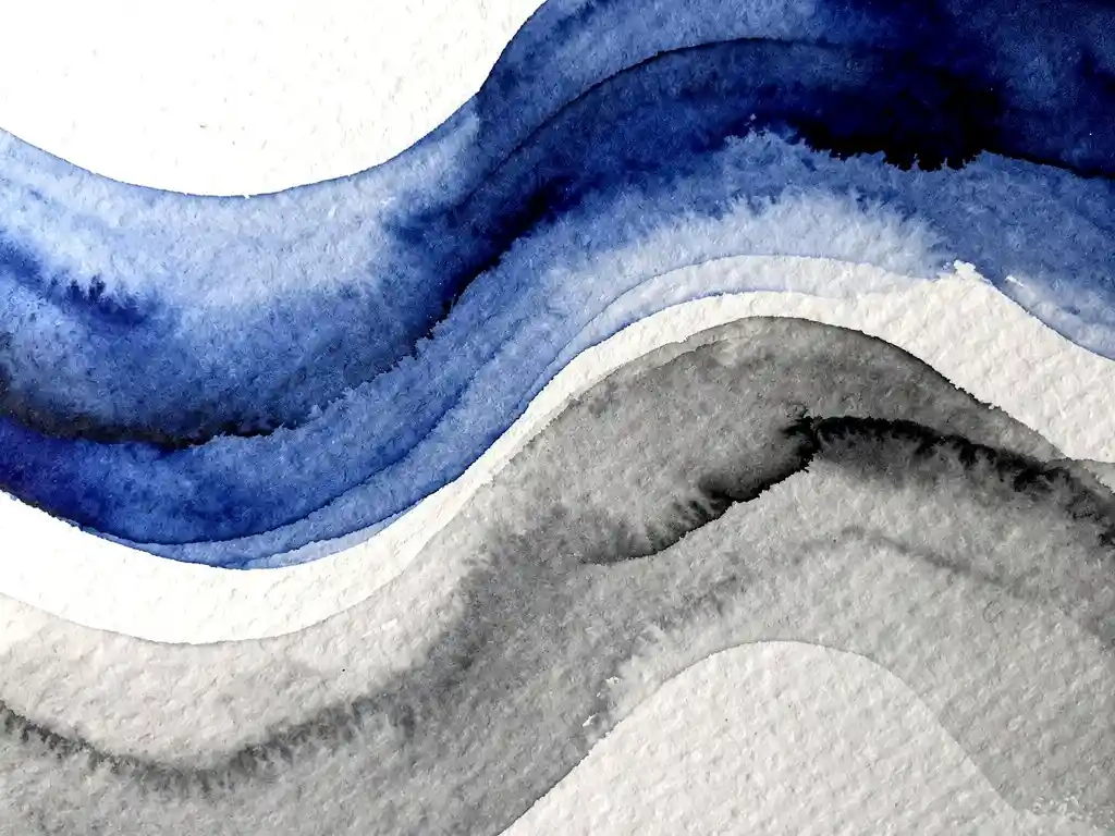 Abstracte aquarel met kobaltblauwe verfstromen die overvloeien in zachte grijze wassen op wit papier